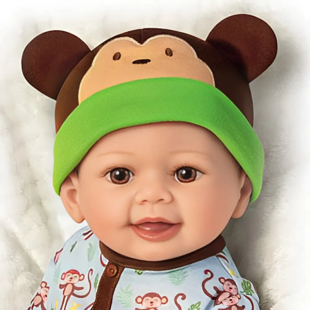 The Ashton-Drake Galleries Lucas Monkey-Themed Lifelike Baby Doll RealTouch® Vinyl Poseable Weighted Cloth Body Hand-rooted Hair by Linda Murray 18-inches