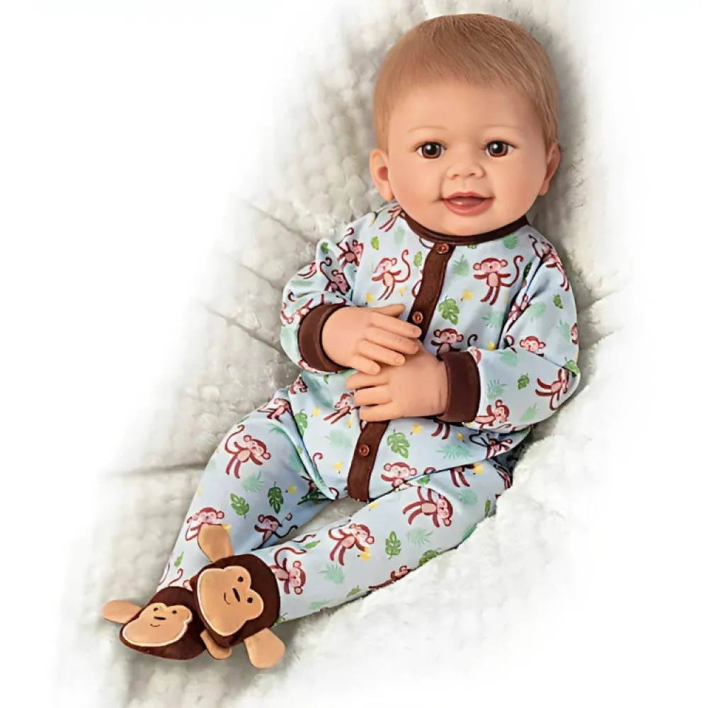 The Ashton-Drake Galleries Lucas Monkey-Themed Lifelike Baby Doll RealTouch® Vinyl Poseable Weighted Cloth Body Hand-rooted Hair by Linda Murray 18-inches